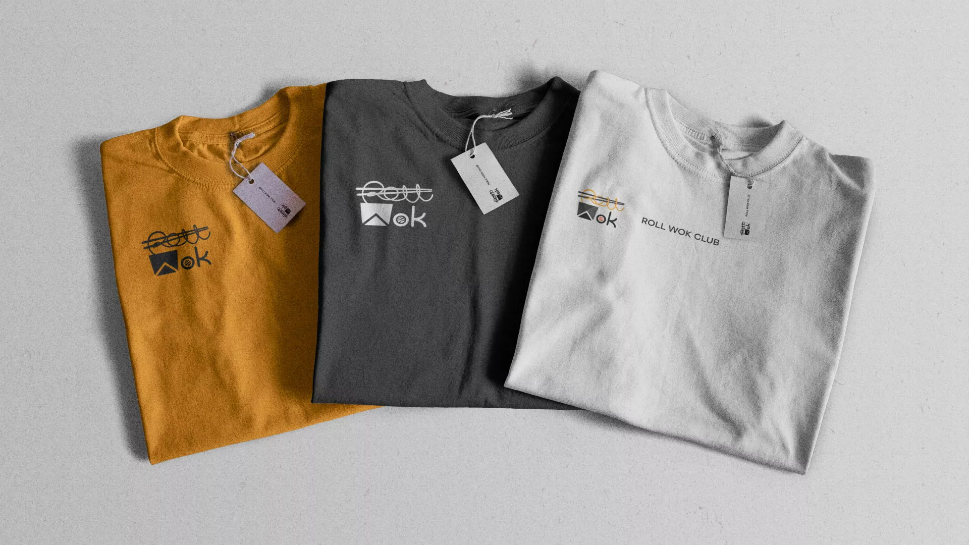 Разработка логотипа суши-бара «Roll Wok Club» в Кремёнках